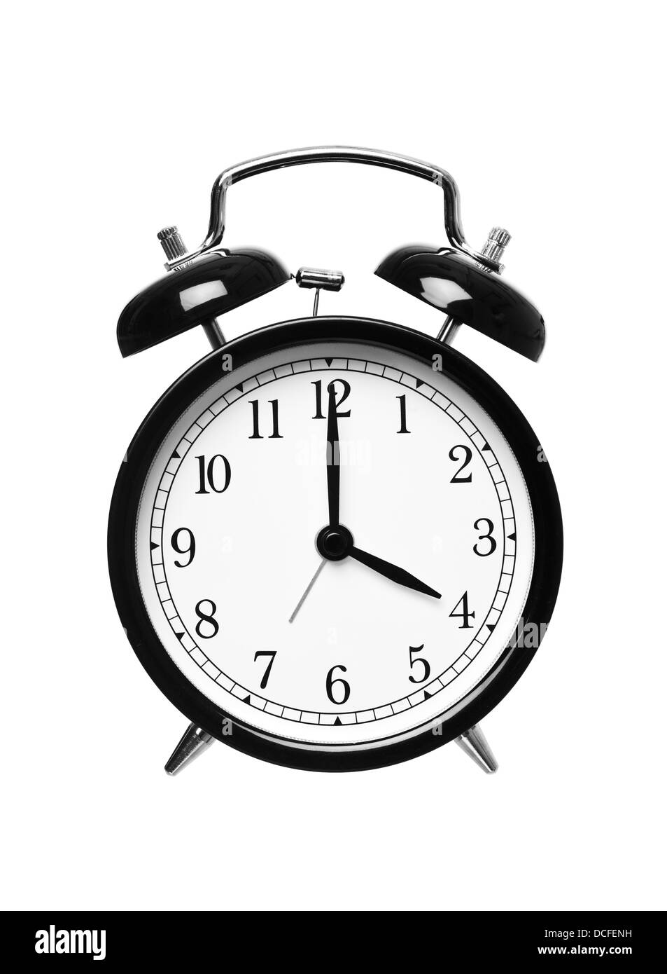 Alarm clock shows four o`clock Stock Photo Alamy